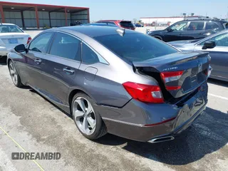 2019 Honda Accord Touring with VIN 1HGCV2F92KA016179, listed as a IAAI auction lot 41975156 with 101,674 mi miles and . Bid and sale history available at DreamBid. Image 3.