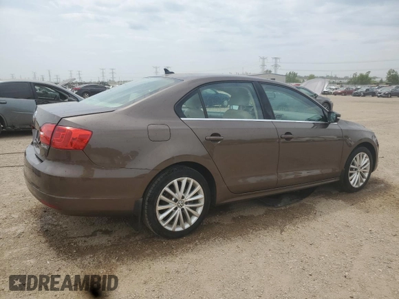 2012 Volkswagen Jetta SEL with VIN 3VWLP7AJ1CM301674, listed as a Copart auction lot 59000735 with 118,308 mi miles and Salvage title. Bid and sale history available at DreamBid. Image 3.