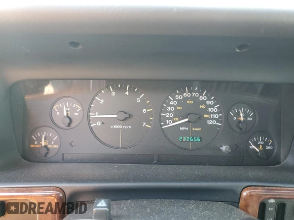 1998 Jeep Grand Cherokee Laredo with VIN 1J4GZ48YXWC299827, listed as a Copart auction lot 76898264 with 232,656 mi miles and Clean Title. Bid and sale history available at carsss.com. Image 9.