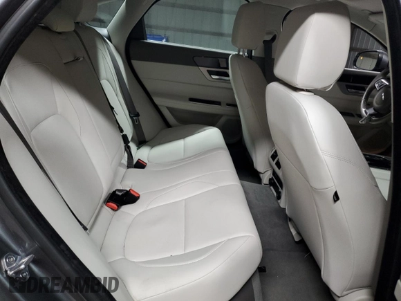 2017 Jaguar XF with VIN SAJBJ4BN3HCY42655, listed as a Copart auction lot 87798165 with 80,700 mi miles and Salvage Title. Bid and sale history available at DreamBid. Image 10.