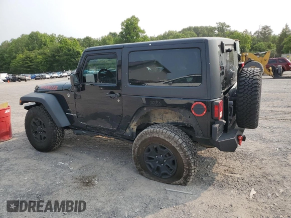 2013 Jeep Wrangler Sport z VIN 1C4AJWAG5DL671491, wystawiony jako Copart lot #59306745 z przebiegiem 111 778 mil mil oraz Szkoda całkowita • Salvage title. Historia ofert i sprzedaży dostępna na DreamBid. Obrazek 2.