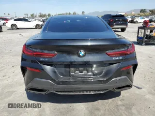 2024 BMW 8 Series 840i z VIN WBAAE4C05RCN32734, wystawiony jako Copart lot #51999545 z przebiegiem Nie podano mil oraz Szkody całkowita. Historia ofert i sprzedaży dostępna na DreamBid. Obrazek 6.