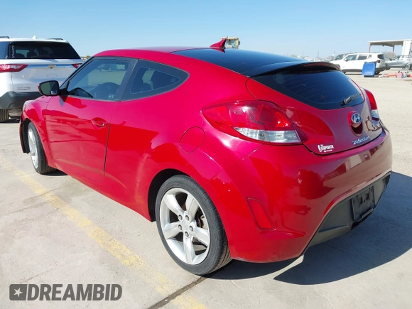 2013 Hyundai Veloster w/Gray Int z VIN KMHTC6AD0DU118150, wystawiony jako IAAI lot #41796309 z przebiegiem 249 384 mil mil oraz . Historia ofert i sprzedaży dostępna na DreamBid. Obrazek 3.