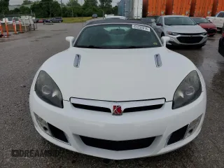 2008 Saturn Sky Red Line z VIN 1G8MG35X98Y102960, wystawiony jako Copart lot #61233914 z przebiegiem 129 890 mil mil oraz Szkody całkowita. Historia ofert i sprzedaży dostępna na DreamBid. Obrazek 5.