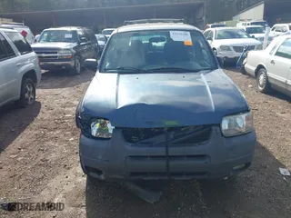 2001 Ford Escape XLT with VIN 1FMYU03181KC56156, listed as a IAAI auction lot 41231100 with 262,875 mi miles. Bid and sale history available at carsss.com. Image 6.