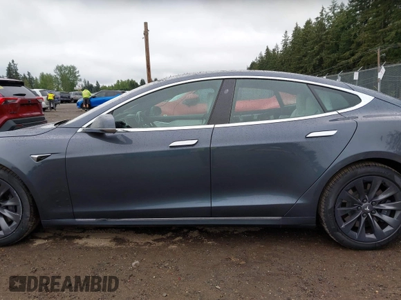 2017 Tesla Model S 100D with VIN 5YJSA1E26HF224568, listed as a IAAI auction lot 42140201 with 102,403 mi miles. Bid and sale history available at carsss.com. Image 15.