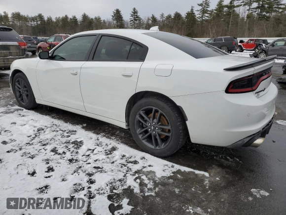 2019 Dodge Charger SXT with VIN 2C3CDXJG6KH730441, listed as a Copart auction lot 87877955 with 50,892 mi miles and Salvage Title. Bid and sale history available at DreamBid. Image 2.