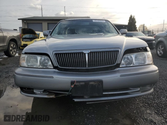 1999 Infiniti Q45 z VIN JNKBY31A3XM602869, wystawiony jako Copart lot #78799354 z przebiegiem 189 083 mil mil oraz Szkoda całkowita • Salvage title. Historia ofert i sprzedaży dostępna na DreamBid. Obrazek 5.