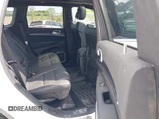 2014 Jeep Grand Cherokee Summit with VIN 1C4RJFJG0EC174871, listed as a IAAI auction lot 42341312 with 170,743 mi miles and . Bid and sale history available at DreamBid. Image 8.