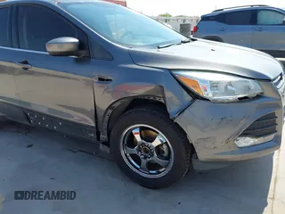 2014 Ford Escape SE with VIN 1FMCU0GX8EUD57801, listed as a IAAI auction lot 41856252 with 136,980 mi miles. Bid and sale history available at carsss.com. Image 6.