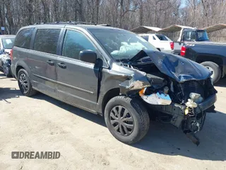 2012 Dodge Grand Caravan SE with VIN 2C4RDGBG1CR214021, listed as a IAAI auction lot 41765065 with 210,794 mi miles and . Bid and sale history available at DreamBid. Image 1.