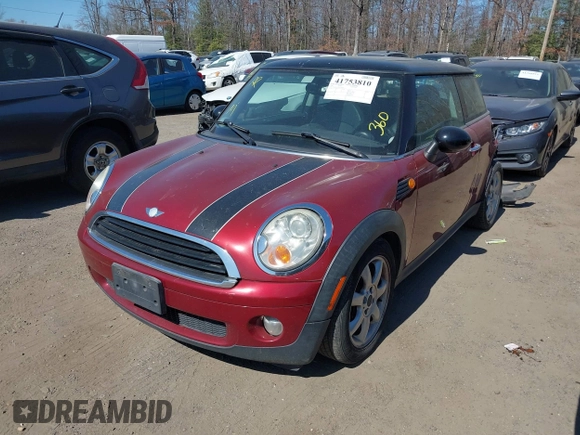 2007 MINI Hardtop with VIN WMWMF33537TU60428, listed as a IAAI auction lot 41753810 with 218,137 mi miles and . Bid and sale history available at DreamBid. Image 2.