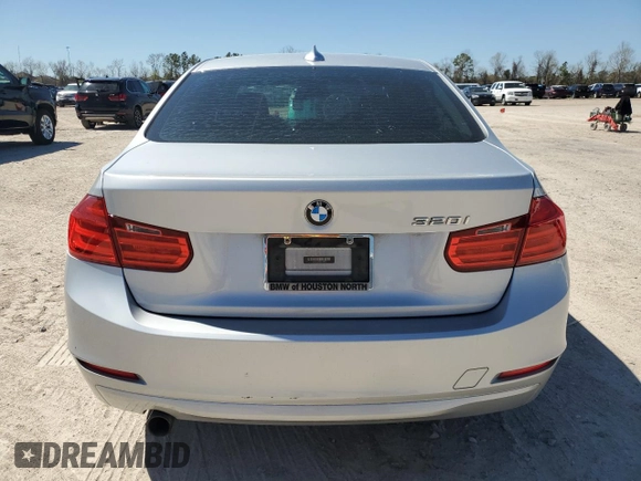 2013 BMW 3 Series 320i with VIN WBA3B1C50DK128525, listed as a Copart auction lot 48618015 with 124,304 mi miles and Salvage Title. Bid and sale history available at carsss.com. Image 6.