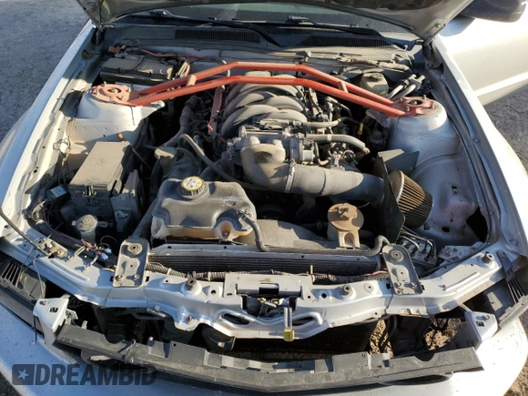2006 Ford Mustang GT Deluxe z VIN 1ZVFT82H065132980, wystawiony jako Copart lot #52818745 z przebiegiem 207 854 mil mil oraz Szkoda całkowita • Salvage title. Historia ofert i sprzedaży dostępna na DreamBid. Obrazek 11.