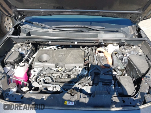 2022 Toyota RAV4 Hybrid SE z VIN 4T3T6RFV5NU101105, wystawiony jako IAAI lot #42666372 z przebiegiem 7 644 mil mil oraz . Historia ofert i sprzedaży dostępna na DreamBid. Obrazek 10.