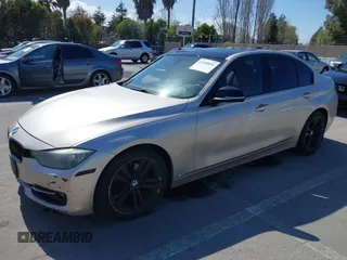 2013 BMW 3 Series 328i with VIN WBA3C1G58DNR44453, listed as a IAAI auction lot 41948831 with 170,153 mi miles. Bid and sale history available at carsss.com. Image 2.