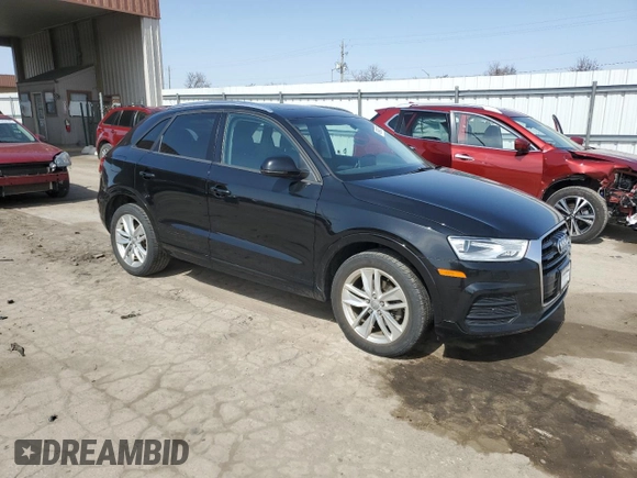 2017 Audi Q3 Premium with VIN WA1ECCFS1HR014580, listed as a Copart auction lot 49948725 with 119,336 mi miles and Salvage title. Bid and sale history available at DreamBid. Image 4.