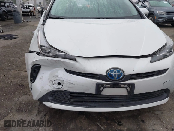 2021 Toyota Prius L Eco with VIN JTDKAMFU6M3150707, listed as a IAAI auction lot 41867272 with 55,499 mi miles and . Bid and sale history available at DreamBid. Image 6.