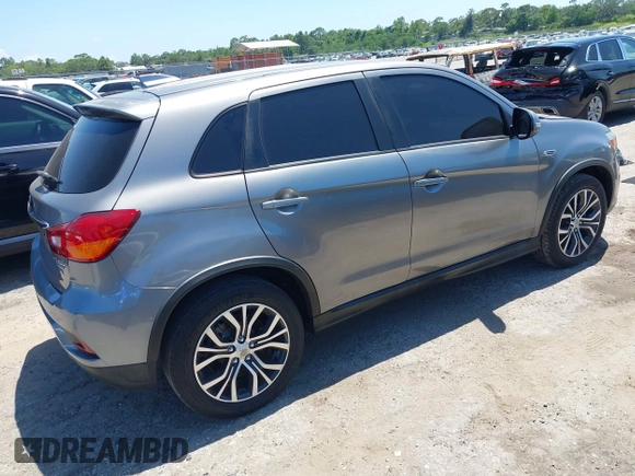2018 Mitsubishi Outlander SE with VIN JA4AP3AW9JU012575, listed as a IAAI auction lot 42303672 with 97,524 mi miles and . Bid and sale history available at DreamBid. Image 4.