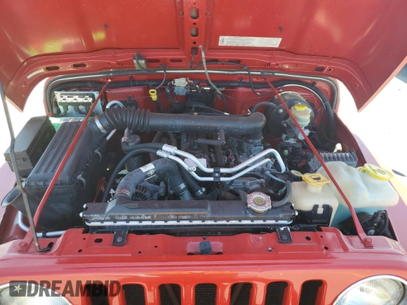 2004 Jeep Wrangler Sport with VIN 1J4FA49S24P720488, listed as a Copart auction lot 60331795 with 134,974 mi miles and Salvage title. Bid and sale history available at DreamBid. Image 11.