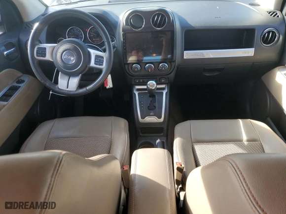 2014 Jeep Compass Latitude with VIN 1C4NJCEB9ED660326, listed as a Copart auction lot 50582145 with 60,712 mi miles and Salvage Title. Bid and sale history available at carsss.com. Image 8.