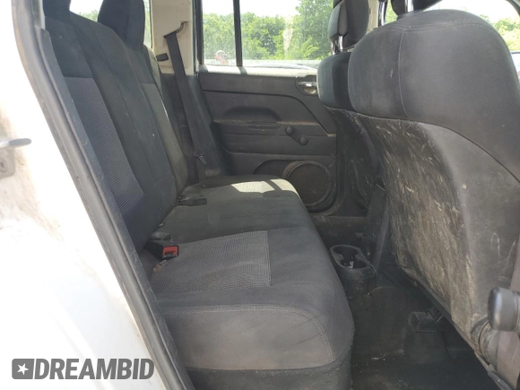 2013 Jeep Patriot Sport z VIN 1C4NJPBA5DD214479, wystawiony jako Copart lot #57442125 z przebiegiem 311 252 mil mil oraz Czysty tytuł • Clean title. Historia ofert i sprzedaży dostępna na DreamBid. Obrazek 10.
