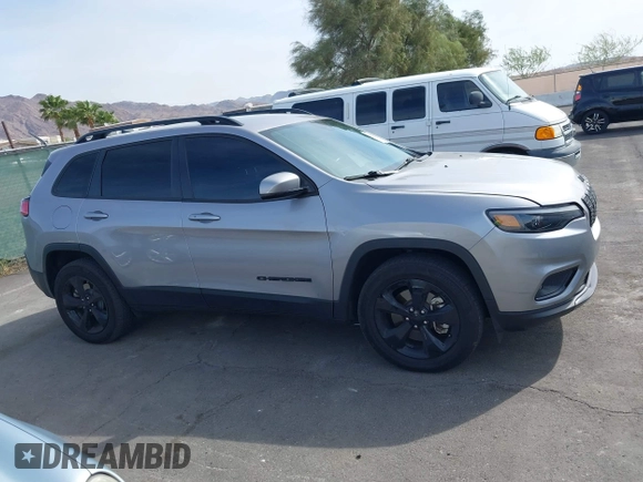 2021 Jeep Cherokee Altitude with VIN 1C4PJMLBXMD157985, listed as a IAAI auction lot 41916748 with 71,401 mi miles. Bid and sale history available at carsss.com. Image 13.