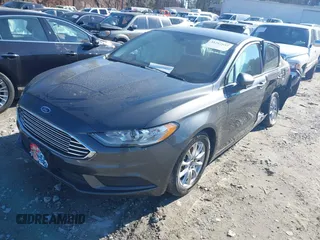 2017 Ford Fusion S with VIN 3FA6P0G78HR369523, listed as a IAAI auction lot 41267657 with 127,628 mi miles. Bid and sale history available at carsss.com. Image 2.