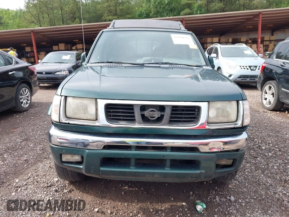 2000 Nissan Frontier XE with VIN 1N6ED27T5YC429406, listed as a IAAI auction lot 42150671 with 303,869 mi miles and . Bid and sale history available at DreamBid. Image 6.