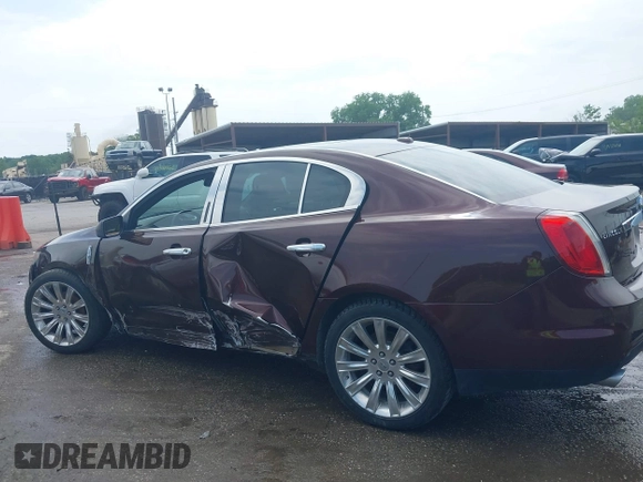 2009 Lincoln MKS with VIN 1LNHM93R69G628697, listed as a IAAI auction lot 39338358 with 125,585 mi miles and . Bid and sale history available at DreamBid. Image 15.