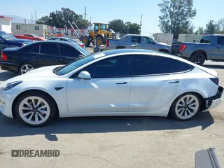 2022 Tesla Model 3 with VIN 5YJ3E1EA3NF294282, listed as a IAAI auction lot 41992046 with 22,383 mi miles. Bid and sale history available at carsss.com. Image 14.