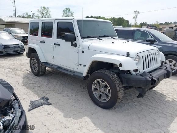 2015 Jeep Wrangler Unlimited Rubicon Hard Rock with VIN 1C4HJWFG7FL684057, listed as a IAAI auction lot 41963885 with 103,240 mi miles. Bid and sale history available at carsss.com. Image 1.