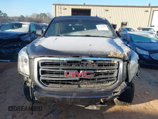 2015 GMC Yukon SLE with VIN 1GKS2AKC4FR510778, listed as a IAAI auction lot 41345528 with 159,760 mi miles. Bid and sale history available at carsss.com. Image 12.