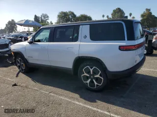 2024 Rivian R1S Adventure with VIN 7PDSGABA6RN043721, listed as a Copart auction lot 64231094 with 0 mi miles and Salvage Title. Bid and sale history available at carsss.com. Image 2.