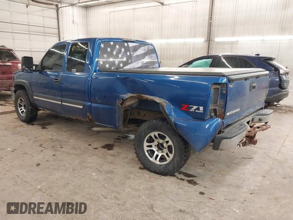 2003 Chevrolet Silverado 1500 with VIN 2GCEK19T931236982, listed as a IAAI auction lot 41178535 with 144,996 mi miles. Bid and sale history available at carsss.com. Image 3.