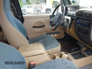 2000 Jeep Wrangler Sahara with VIN 1J4FA59S8YP722208, listed as a IAAI auction lot 42294978 with 238,024 mi miles and . Bid and sale history available at DreamBid. Image 5.