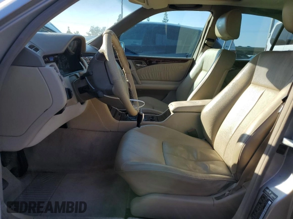 1998 Mercedes-Benz E-Class with VIN WDBJF65FXWA497997, listed as a Copart auction lot 87969125 with 145,322 mi miles and Salvage Title. Bid and sale history available at carsss.com. Image 7.