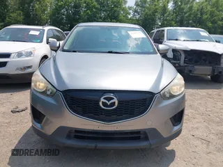 2014 Mazda CX-5 Sport with VIN JM3KE4BE9E0411177, listed as a IAAI auction lot 42411938 with 167,709 mi miles and . Bid and sale history available at DreamBid. Image 12.
