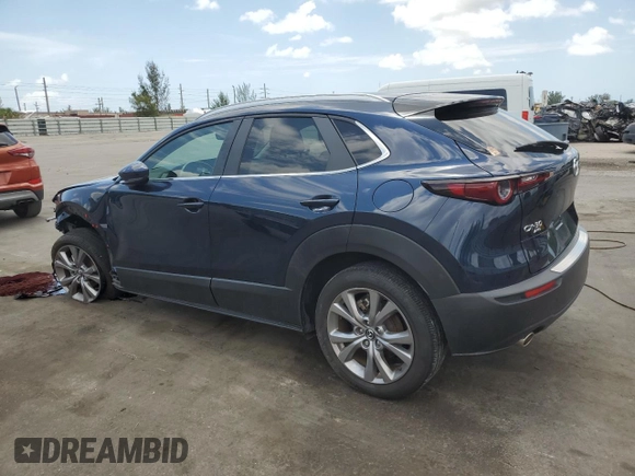 2023 Mazda CX-30 S Preferred with VIN 3MVDMBCM2PM555893, listed as a Copart auction lot 58480415 with 24,812 mi miles and Non repairable. Bid and sale history available at DreamBid. Image 2.