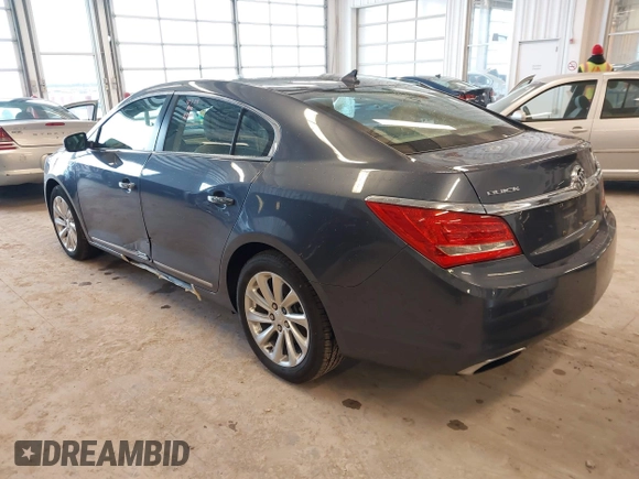 2014 Buick LaCrosse Leather with VIN 1G4GB5G39EF132695, listed as a IAAI auction lot 41728596 with 124,639 mi miles and . Bid and sale history available at DreamBid. Image 3.