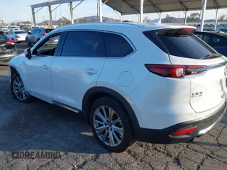 2021 Mazda CX-9 Signature with VIN JM3TCBEY6M0536883, listed as a IAAI auction lot 41388130 with 65,613 mi miles. Bid and sale history available at carsss.com. Image 3.