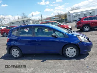 2013 Honda Fit with VIN JHMGE8H38DC047079, listed as a IAAI auction lot 42037073 with 32,794 mi miles. Bid and sale history available at carsss.com. Image 13.