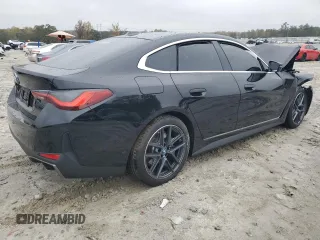 2024 BMW i4 eDrive40 with VIN WBY73AW07RFT07127, listed as a Copart auction lot 79695854 with 2,996 mi miles and Salvage Title. Bid and sale history available at carsss.com. Image 3.