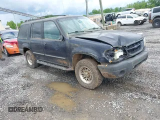 1999 Ford Explorer XL z VIN 1FMDU34X5XUC08663, wystawiony jako IAAI lot #42385444 z przebiegiem 177 387 mil mil oraz . Historia ofert i sprzedaży dostępna na DreamBid. Obrazek 1.