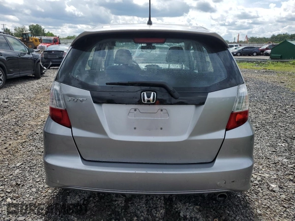 2009 Honda Fit Sport with VIN JHMGE88439S029286, listed as a Copart auction lot 63357784 with 112,705 mi miles and Salvage Title. Bid and sale history available at carsss.com. Image 6.
