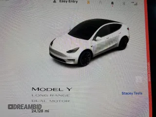 2021 Tesla Model Y Long Range z VIN 5YJYGDEE2MF243858, wystawiony jako Copart lot #58043055 z przebiegiem 24 128 mil mil oraz Szkoda całkowita • Salvage title. Historia ofert i sprzedaży dostępna na DreamBid. Obrazek 9.