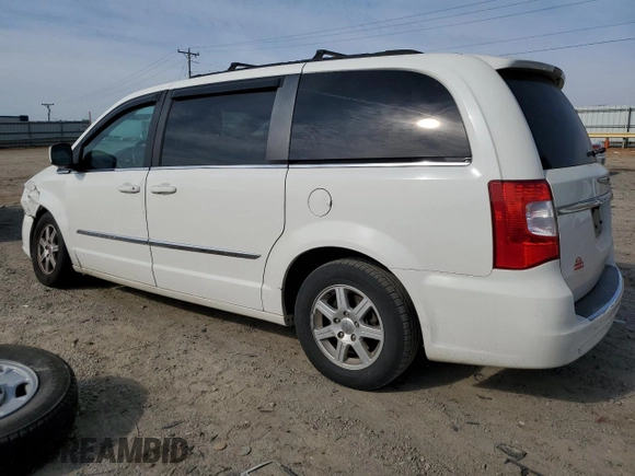 2011 Chrysler Town & Country Touring with VIN 2A4RR5DG7BR712588, listed as a Copart auction lot 54236425 with 252,748 mi miles and Clean Title. Bid and sale history available at DreamBid. Image 2.