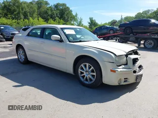 2008 Chrysler 300 Limited with VIN 2C3KA33G48H120184, listed as a IAAI auction lot 42624646 with 196,981 mi miles and . Bid and sale history available at DreamBid. Image 1.