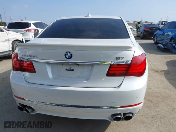 2015 BMW 7 Series 750Li with VIN WBAYE8C52FD785162, listed as a IAAI auction lot 42121389 with 88,783 mi miles and . Bid and sale history available at DreamBid. Image 16.