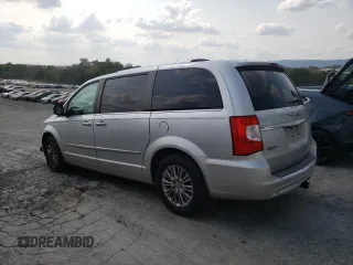 2011 Chrysler Town & Country Limited with VIN 2A4RR6DGXBR698448, listed as a Copart auction lot 70932134 with 130,140 mi miles and Salvage Title. Bid and sale history available at DreamBid. Image 2.